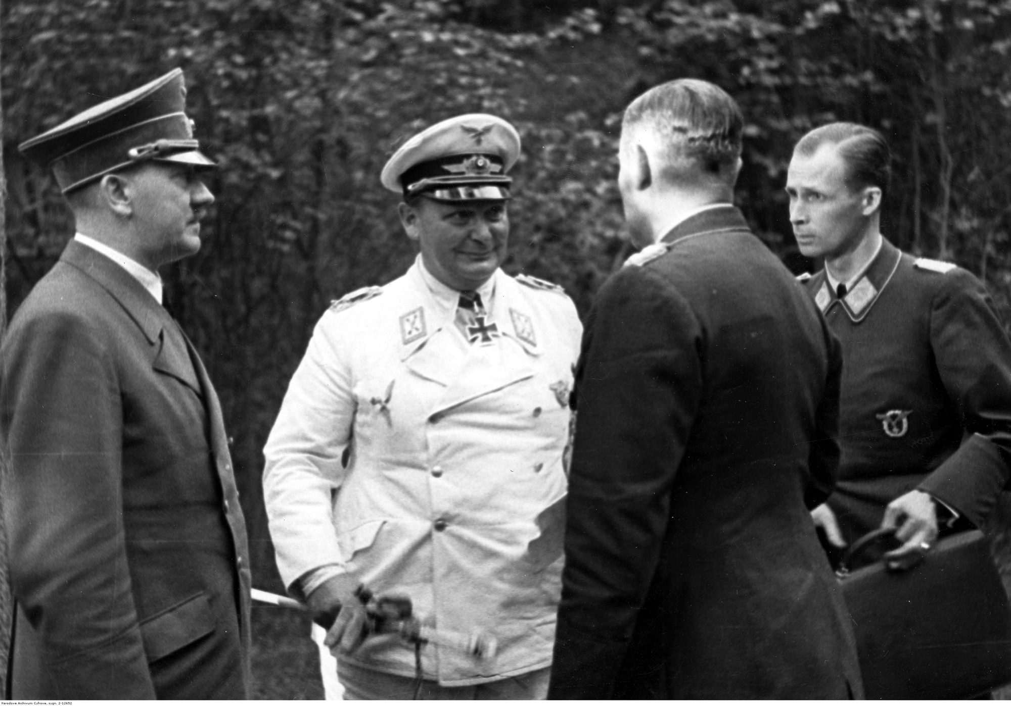 Meeting with Goering and general Karl-Heinrich Bodenschatz, liaison officer between the two leaders of the Party, in the forest of the Wolfschanze